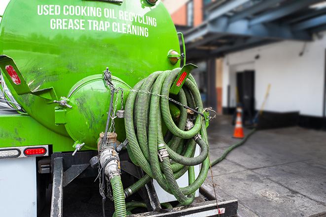 truck pumping out a large grease trap in American Canyon